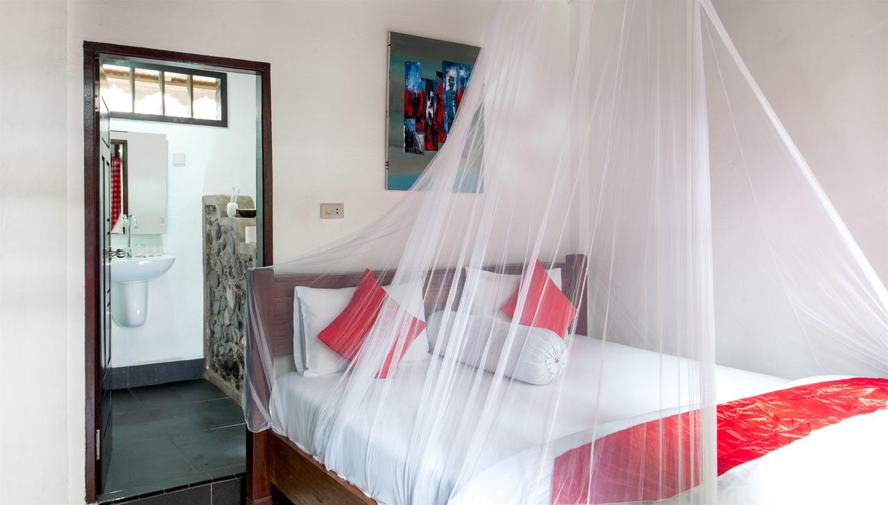Ecotravel Cottages Bukit Lawang Extérieur photo